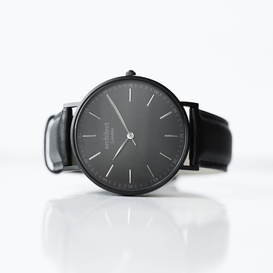 Personalised minimalist watch with jet black leather strap and engraving